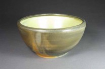 Serving Bowl with Yellow Glaze Inside.
