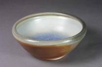 Small Serving Bowl with Blue Inside, Gray/Brown/Orange Shiny Outside.