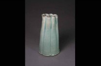 Large turquoise porcelain fluted vase.