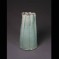 Large turquoise porcelain fluted vase.