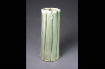 Large green porcelain fluted vase.